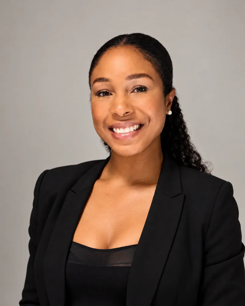 Tiffany S. Shields, smiling, in a black blazer